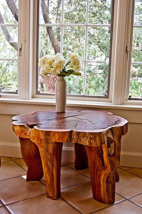 Stump table in the interior of a glazed veranda