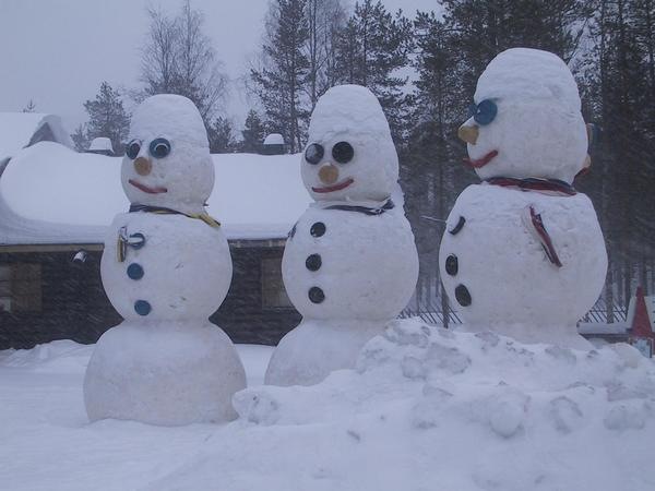 Three snowmen, three cheerful friends