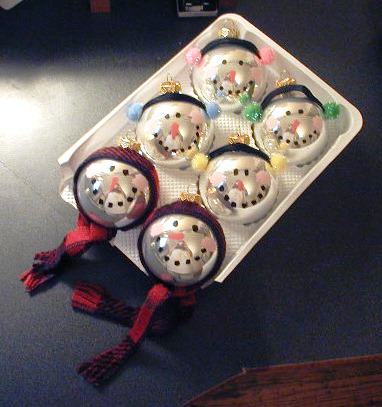 Christmas balls in the form of snowman heads