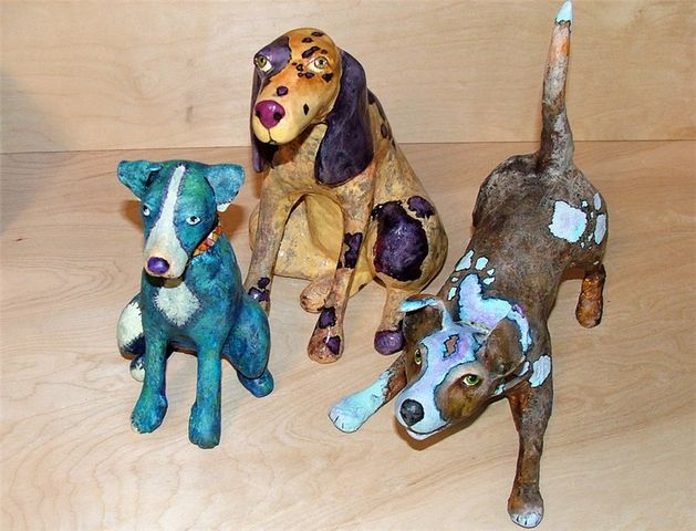 Dogs made of papier mache at home