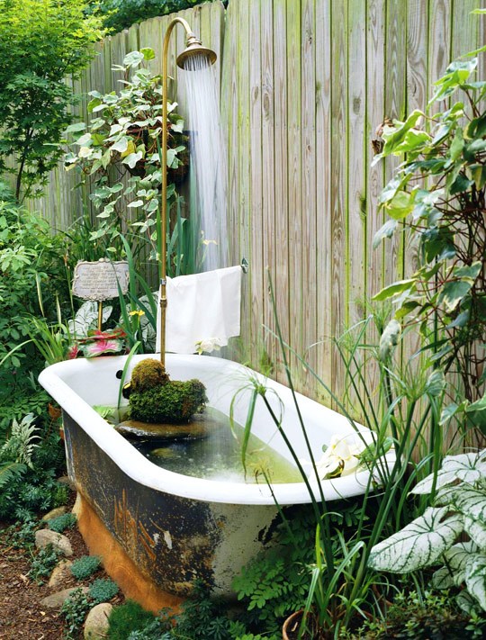 old bath as a garden fountain