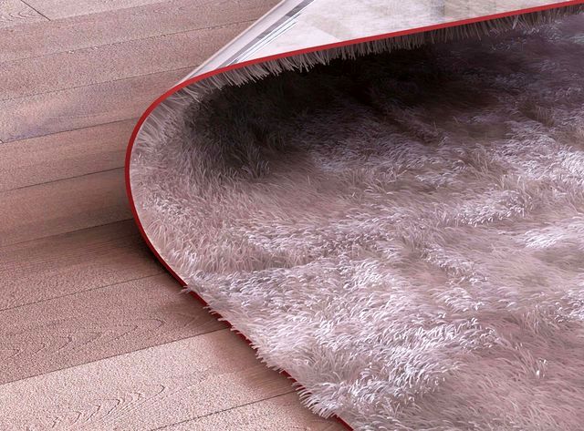 Stumble Upon carpet with a wrapped edge in the form of a table