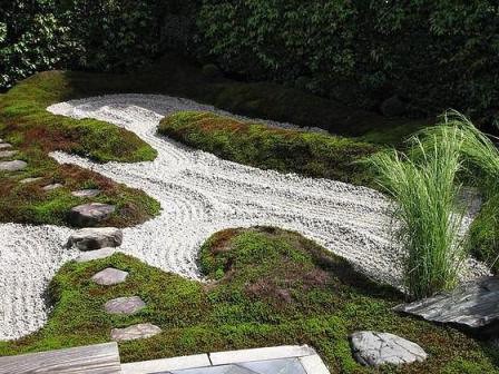 Smooth borders of a dry stream in a summer cottage photo