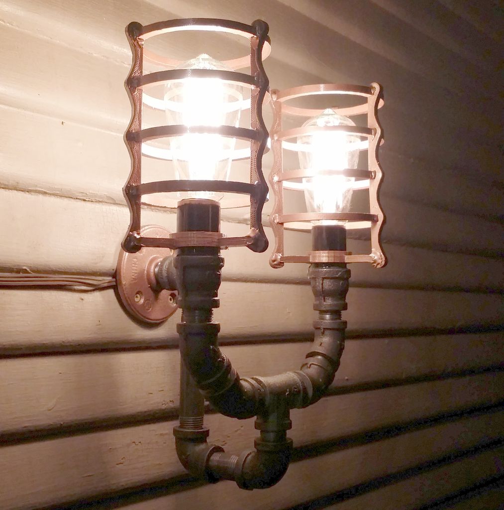 Luminaire made of metal fittings for pipes