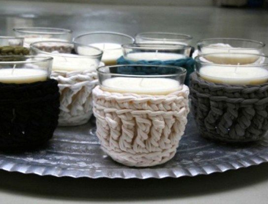 Cozy knitted candlesticks in the photo