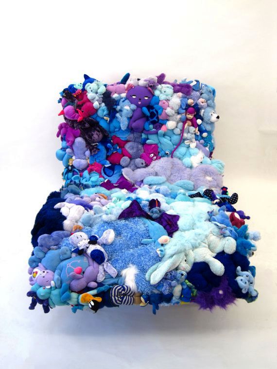 Sofa of soft toys in blue tones