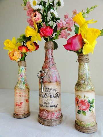 Beautiful glass bottle vases decorated with corrugated paper