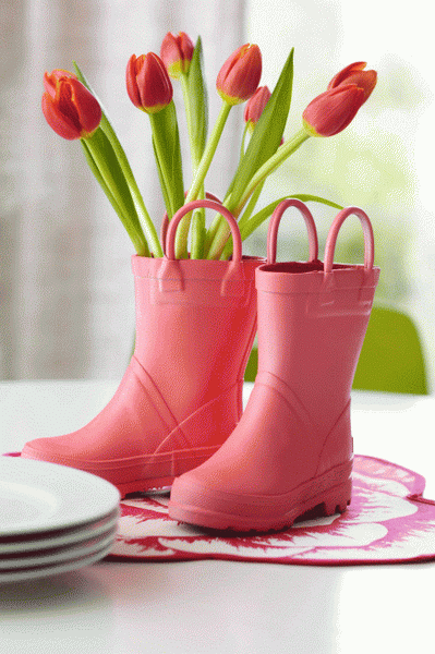 Rubber boots as a flower vase and bright detail