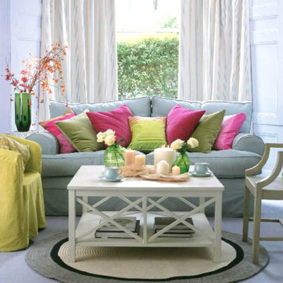 Bright pillows in the spring decor of the apartment