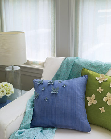Spring pillows with flowers and butterflies