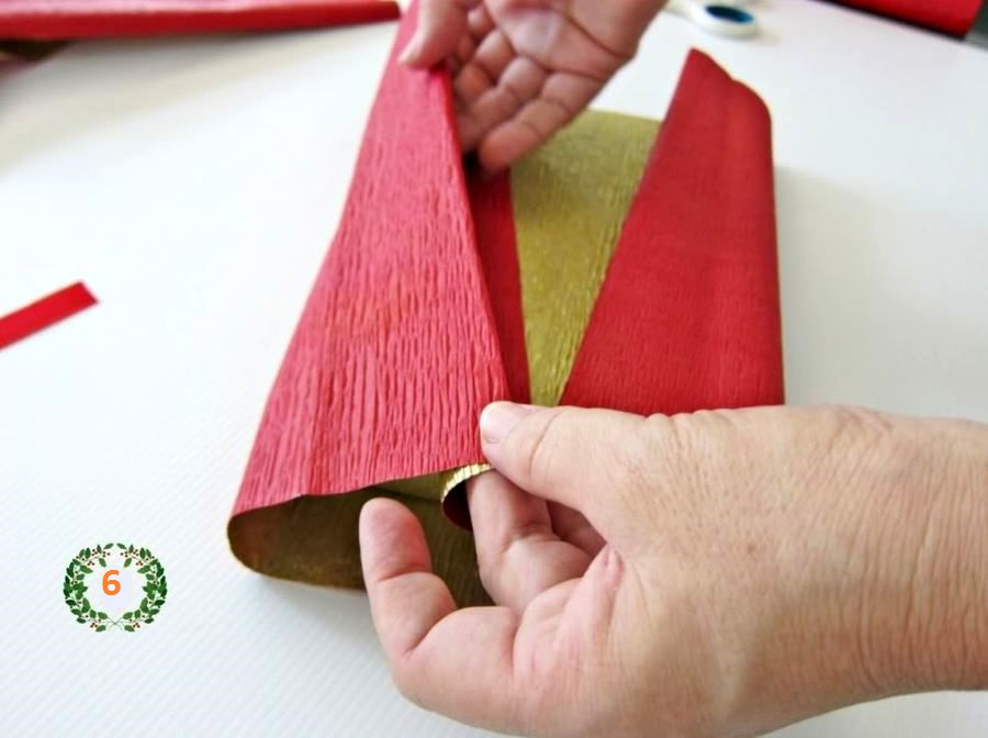 gift wrapping in paper with herringbone step 4