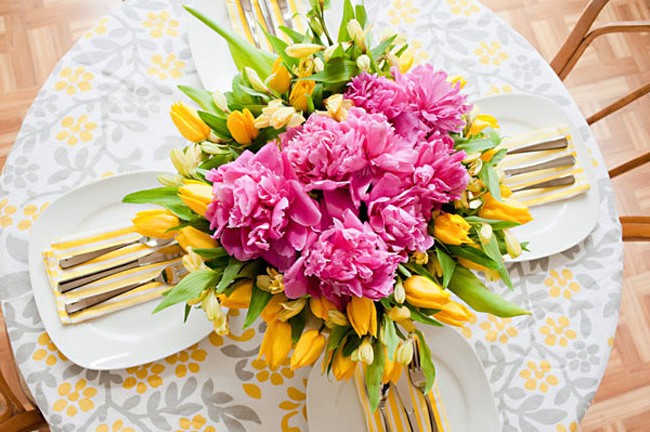 Arrangement of flowers in a breakfast table setting